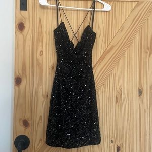 Black sparkly short homecoming dress.